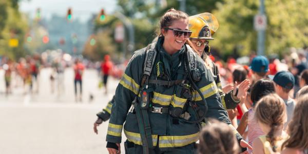 Paid On-Call female firefighter at 2023 Canada Day parade