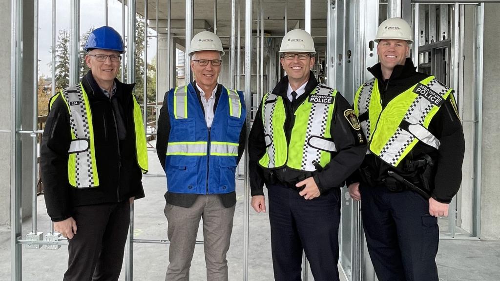 Inspector Tom Chesley, Mayor Ross Siemens, Chief Colin Watson and Deputy Chief Constable Dan Culbertson check out work underway at the new Abbotsford Police Department headquarters.