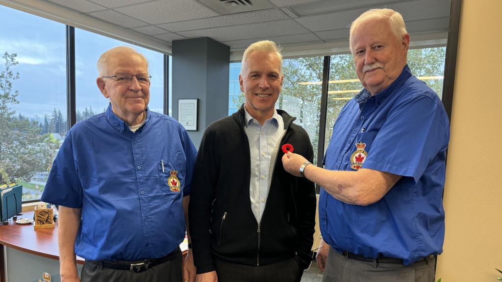 Royal Canadian Legion Abbotsford Branch 15 president Ross Craddock and vice-president Kelly Watson presented Mayor Siemens with a poppy in his office on Oct. 23.