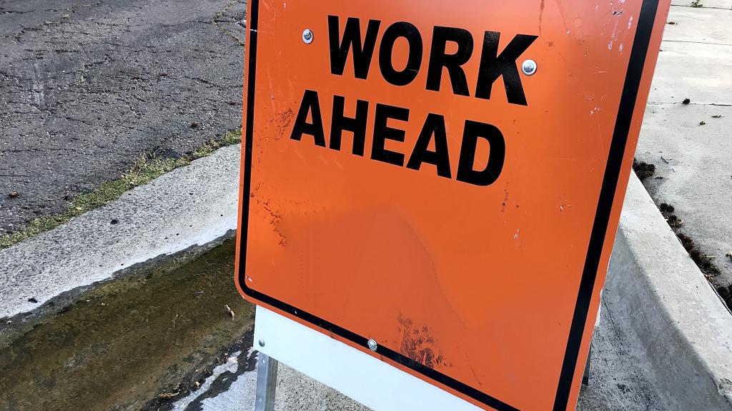 Sign says Work Ahead