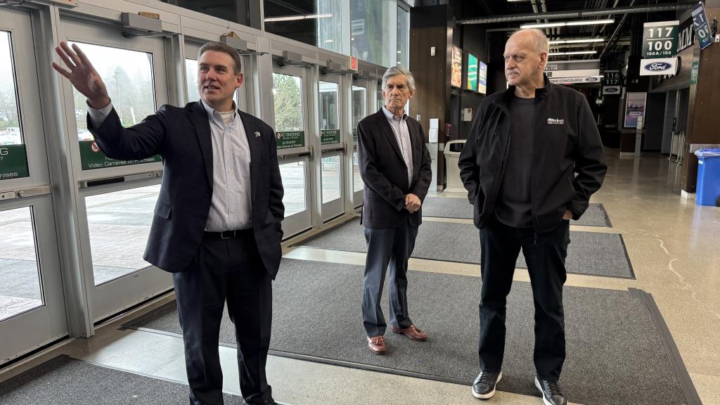 Abbotsford Canucks Chief Operating Officer Jim Kozak leads City staff and Councillors on a tour of Rogers Forum as part of the City’s Business Spotlight series while Councillors Gibson and Loewen look on.
