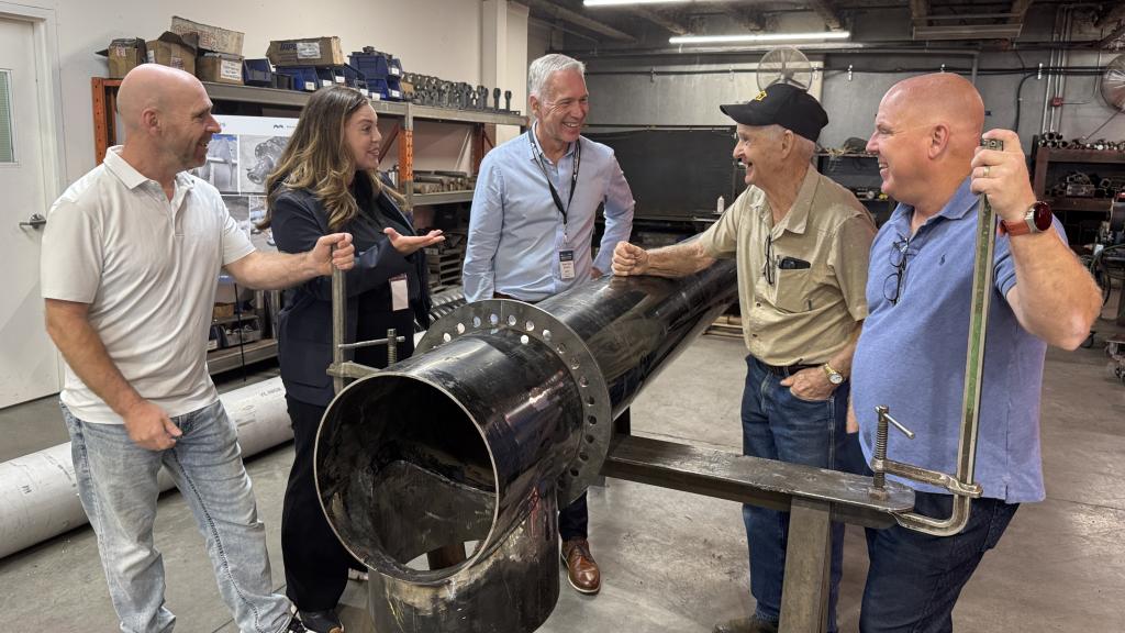 Mayor Siemens and Abbotsford Chamber of Commerce CEO Alex Mitchell chat with Mainland Machinery co-owners David, Henry and Paul Hiebert during a stop on the third annual Abbotsford Manufacturing Industry Tour.