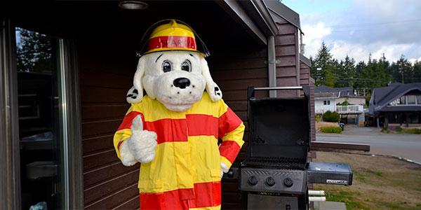 Image of Sparky Cooking at the BBQ