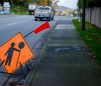 road work sign on road