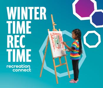 girl standing at an easle