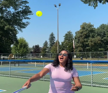 Girl playing pickleball