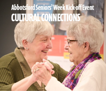 2 Elderly women dancing together