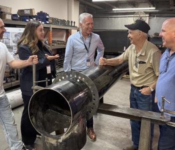 Mayor Siemens and Abbotsford Chamber of Commerce CEO Alex Mitchell chat with Mainland Machinery co-owners David, Henry and Paul Hiebert during a stop on the third annual Abbotsford Manufacturing Industry Tour.