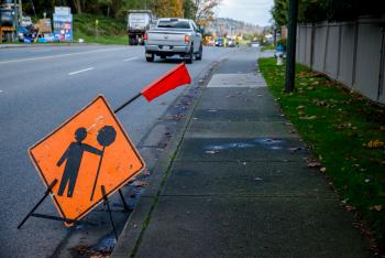 road work sign on road