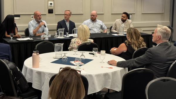 Mayor Siemens and Councillors Driessen and Ross listen to panelists Alan Martens, Minister Glumac, PJ McKnight and Jimmy Dhaliwal. 