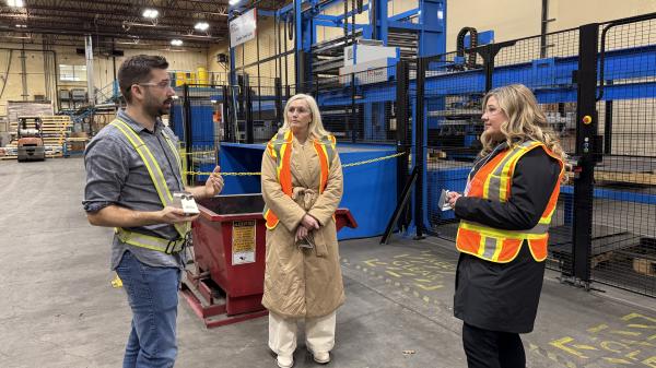 Engineering Manager Cody Bjornsson in the laser cutting department with Councillors Ross and Driessen.