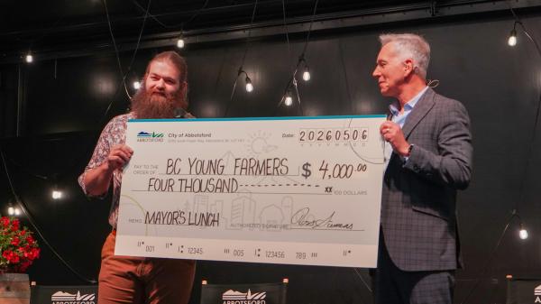 Mayor Siemens presents a cheque to BC Young Farmers.