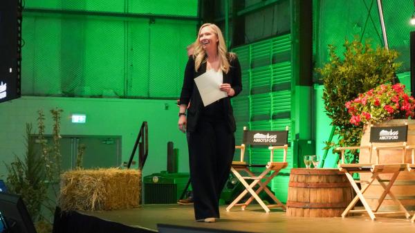 B.C. Agriculture Council executive director Danielle Synotte takes to the stage during the third annual Mayor's Luncheon.