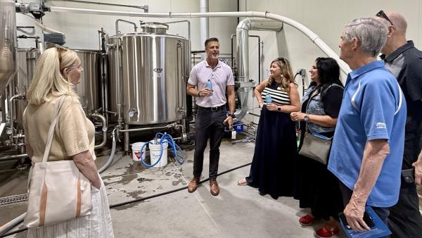 EcoFarm owner Bill Vanderkooi shows Council around the Farmhouse Brewing brewery.