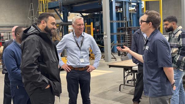 Mayor Siemens learns about Pyrotek Aerospace from Quality Manager Ryan Glasgo during the Manufacturing Industry Tour.